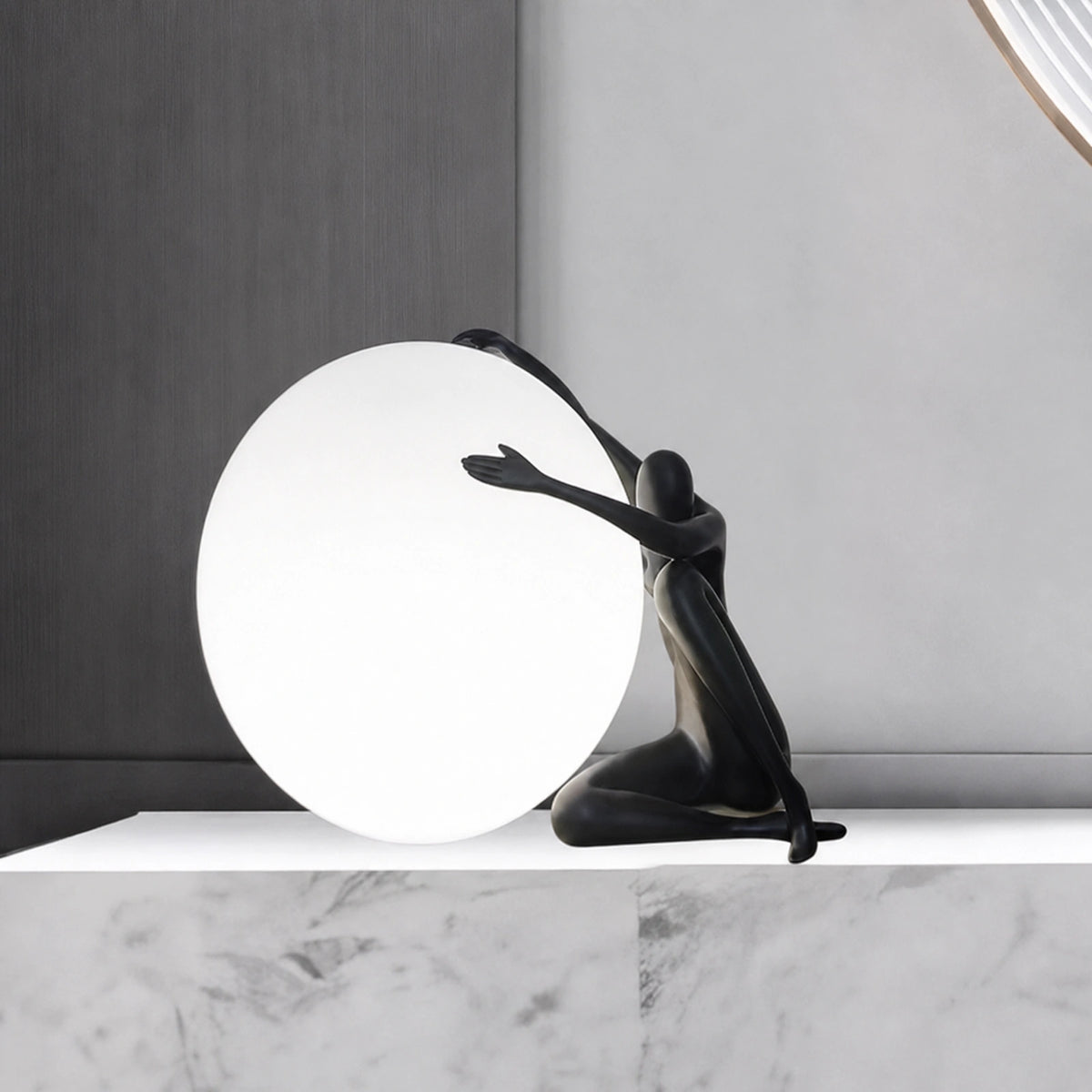 F9184 Black Seated Figure Pushing Globe Sculptural Table Lamp