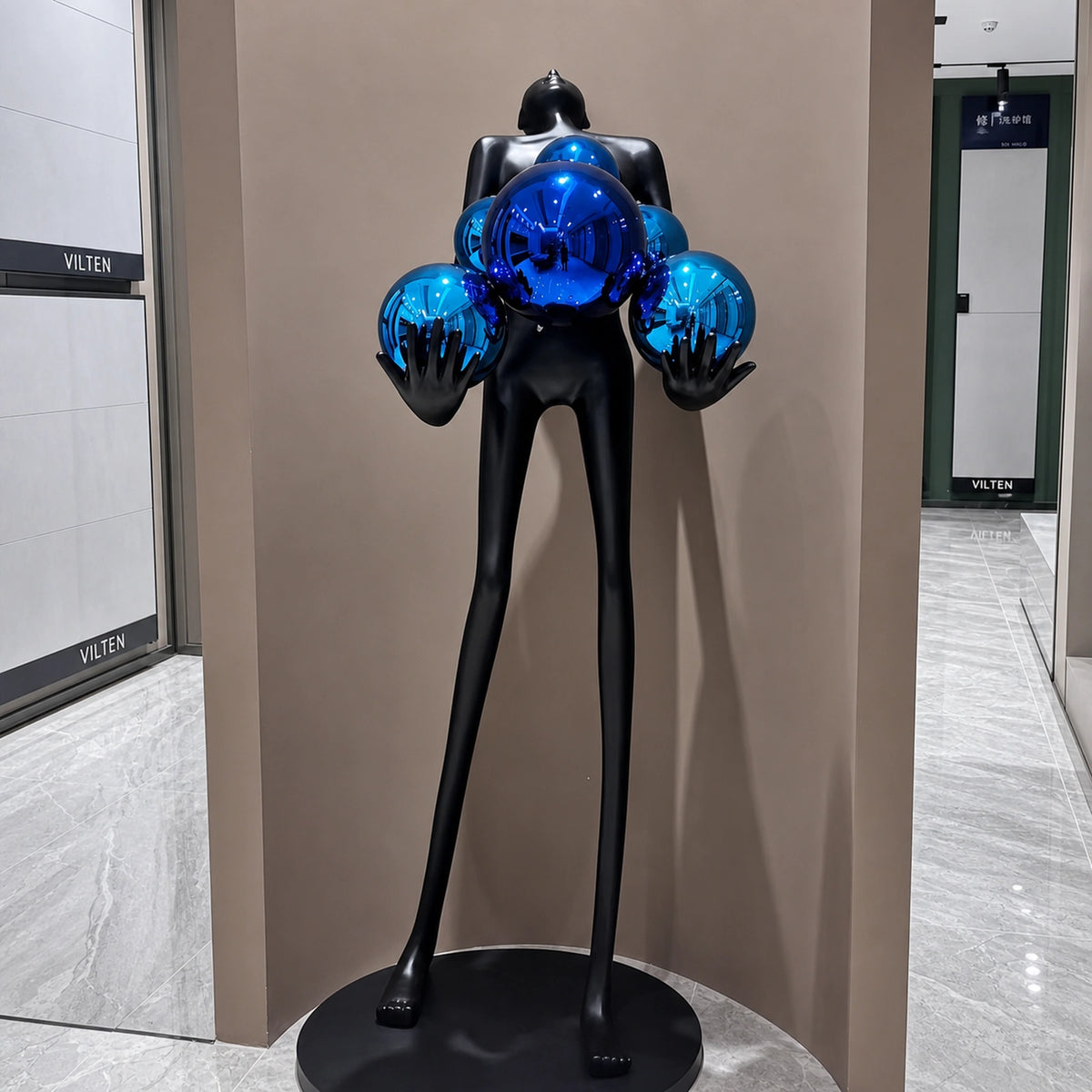 F9101 Bending Figure Holding Spheres Sculpture