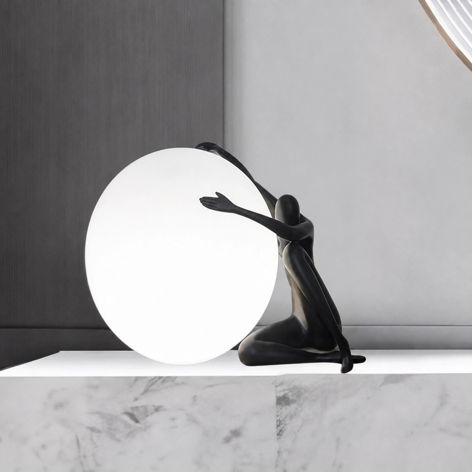 F9184 Black Seated Figure Pushing Globe Sculptural Table Lamp