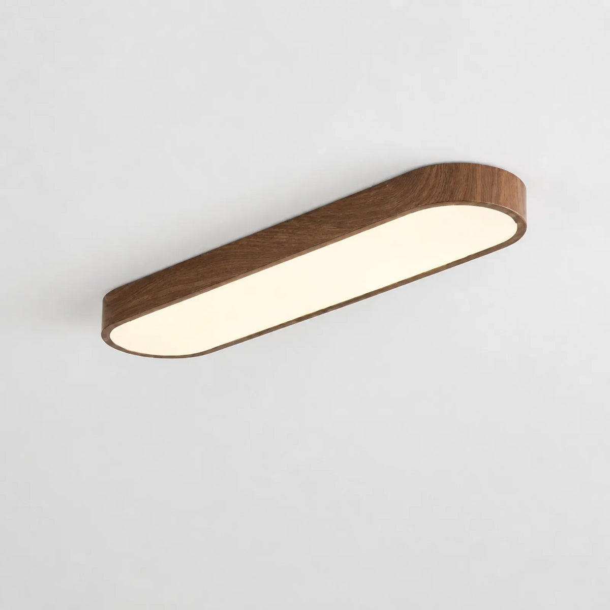 Capsule-Profile Linear Ceiling Light